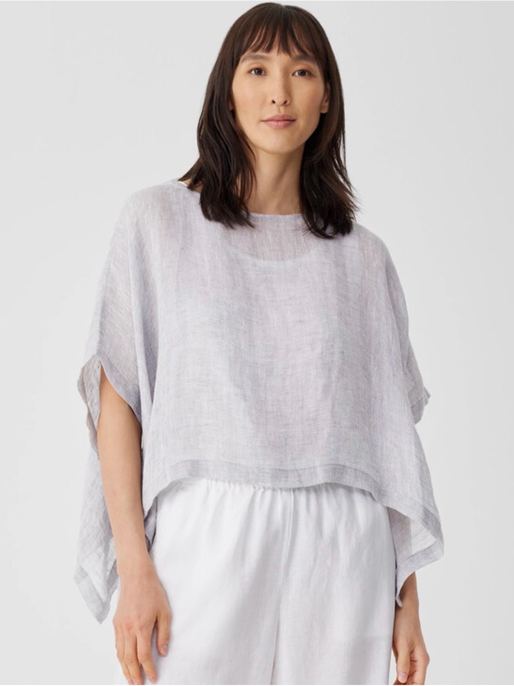 Organic linen gauze poncho in grey featuring side ties and a sheer textual weave